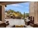 Spacious backyard patio with fireplace and mountain views at 9270 E Thompson Peak Pkwy # 335, Scottsdale, AZ 85255