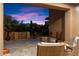 Peaceful backyard patio with mountain views at sunset at 9270 E Thompson Peak Pkwy # 335, Scottsdale, AZ 85255