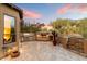 Outdoor kitchen and fireplace on a large patio at 9270 E Thompson Peak Pkwy # 335, Scottsdale, AZ 85255