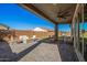 Covered patio with seating area and ceiling fan at 9316 S 39Th Dr, Laveen, AZ 85339