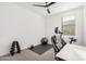 Home office or gym with Peloton bike and weights at 9316 S 39Th Dr, Laveen, AZ 85339