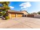 Garage and gated entrance to the property at 9613 W Camino De Oro Dr, Peoria, AZ 85383