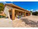 House exterior with covered patio and storage area at 9613 W Camino De Oro Dr, Peoria, AZ 85383