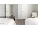 Spacious bedroom with two twin beds and access to hallway at 10401 N 52Nd St # 208, Paradise Valley, AZ 85253