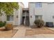 Exterior view of condo building with stairs and landscaping at 10401 N 52Nd St # 208, Paradise Valley, AZ 85253