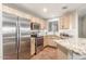 Modern kitchen with granite countertops and stainless steel appliances at 10401 N 52Nd St # 208, Paradise Valley, AZ 85253