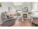 Spacious living room with fireplace and hardwood floors at 10401 N 52Nd St # 208, Paradise Valley, AZ 85253