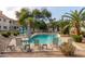 Community pool with lounge chairs and umbrellas at 10401 N 52Nd St # 208, Paradise Valley, AZ 85253