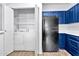 Laundry closet with washer, dryer, and shelving at 1331 W Baseline Rd # 316, Mesa, AZ 85202