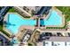 Aerial view of community pool with surrounding patio furniture at 1331 W Baseline Rd # 316, Mesa, AZ 85202