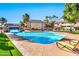 Stunning pool with waterfall and lounge chairs at 1331 W Baseline Rd # 316, Mesa, AZ 85202