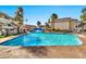 Large community pool with waterfall feature at 1331 W Baseline Rd # 316, Mesa, AZ 85202