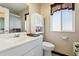 Clean bathroom with white vanity, toilet and shower at 13834 N 103Rd Ave, Sun City, AZ 85351