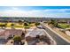 Aerial view of a charming house situated in a quiet golf course community at 14233 W Via Montoya --, Sun City West, AZ 85375