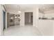 Bright dining area with tile floors and glass sliding doors leading to a patio at 14233 W Via Montoya --, Sun City West, AZ 85375