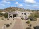 Luxury home with desert landscaping and mountain backdrop at 14425 S Canyon Dr, Phoenix, AZ 85048
