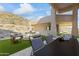 Outdoor patio with seating area and mountain view at 14425 S Canyon Dr, Phoenix, AZ 85048