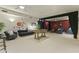 Finished basement with game table and media area at 14425 S Canyon Dr, Phoenix, AZ 85048