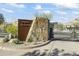 Canyon Reserve community entrance with modern stone and metal gate at 14425 S Canyon Dr, Phoenix, AZ 85048
