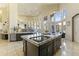Spacious kitchen with large island, stainless steel appliances, and granite countertops at 14425 S Canyon Dr, Phoenix, AZ 85048