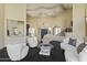 Spacious living area with unique architectural details and dark hardwood floors at 14425 S Canyon Dr, Phoenix, AZ 85048