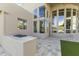 Backyard patio with built-in grill and artificial turf at 14425 S Canyon Dr, Phoenix, AZ 85048