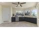 Wet bar with granite countertop and built-in appliances at 14425 S Canyon Dr, Phoenix, AZ 85048