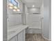 Clean bathroom with updated fixtures and a walk-in shower at 15113 W Cactus Ridge Way, Surprise, AZ 85374
