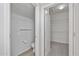 Small bathroom with toilet and access to closet at 15113 W Cactus Ridge Way, Surprise, AZ 85374