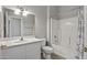 Clean bathroom with white vanity and shower/tub at 15113 W Cactus Ridge Way, Surprise, AZ 85374