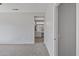 Bedroom with view of bathroom through doorway at 15113 W Cactus Ridge Way, Surprise, AZ 85374