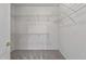 Large walk-in closet with wire shelving at 15113 W Cactus Ridge Way, Surprise, AZ 85374