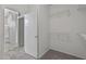Spacious closet with wire shelving and bathroom access at 15113 W Cactus Ridge Way, Surprise, AZ 85374
