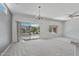 Dining area with backyard view and a chandelier at 15113 W Cactus Ridge Way, Surprise, AZ 85374
