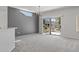Dining room with backyard access and a chandelier at 15113 W Cactus Ridge Way, Surprise, AZ 85374