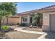 One-story house with walkway, landscaping, and garage at 15113 W Cactus Ridge Way, Surprise, AZ 85374