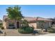 Single-story home with desert landscaping and two-car garage at 15113 W Cactus Ridge Way, Surprise, AZ 85374