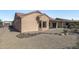 Single-story house with a terracotta roof and desert landscaping at 15113 W Cactus Ridge Way, Surprise, AZ 85374