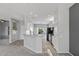 Open kitchen with granite countertops and black appliances at 15113 W Cactus Ridge Way, Surprise, AZ 85374