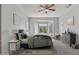 Main bedroom with bay window and ceiling fan at 15113 W Cactus Ridge Way, Surprise, AZ 85374