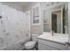 Clean bathroom with shower/tub combo and updated vanity at 15282 W Mckinley St, Goodyear, AZ 85338