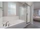 Relaxing bathroom featuring a soaking tub and shower at 15282 W Mckinley St, Goodyear, AZ 85338