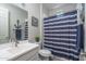 Simple bathroom with a walk-in shower and updated vanity at 15282 W Mckinley St, Goodyear, AZ 85338