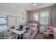 Charming bedroom with a workspace and window seating at 15282 W Mckinley St, Goodyear, AZ 85338