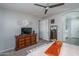 Bright bedroom with built-in dresser and ensuite access at 15282 W Mckinley St, Goodyear, AZ 85338