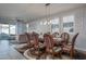 Dining area with wood table and access to the backyard at 15282 W Mckinley St, Goodyear, AZ 85338