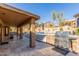 Outdoor patio area with built-in BBQ and access to a beautiful pool at 15708 E Chicory Dr, Fountain Hills, AZ 85268