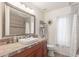 Guest bathroom with single vanity and shower/tub combo at 15708 E Chicory Dr, Fountain Hills, AZ 85268