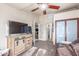 Cozy common area with a leather couch and built-in shelving at 15708 E Chicory Dr, Fountain Hills, AZ 85268