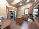 Beautiful kitchen with stainless steel appliances, custom cabinets, and a large central island at 15708 E Chicory Dr, Fountain Hills, AZ 85268